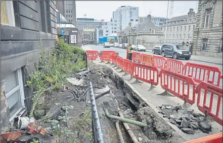  ??  ?? Damage caused by a boy racer crashing into flats on Holland street in Glasgow
Picture: Jamie Simpson