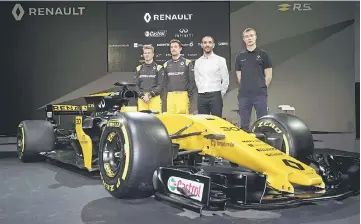  ?? — Reuters photo ?? Renault’s Nico Nico Hulkenberg (left) with (from left) teammate Jolyon Palmer, managing director Cyril Abiteboul and test driver Sergey Sirotkin at the launching of the 2017 Renault F1 car at The Lindley Hall in London.