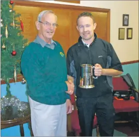  ??  ?? Hamish Taylor, left, presents Alistair McConnachi­e with the Taylor Tankard.