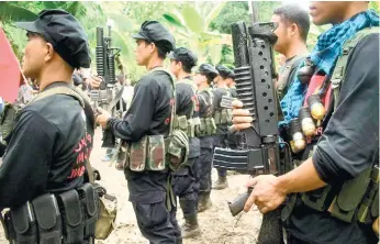  ?? (SUN.STAR FILE) ?? AMBUSH. The New People’s Army denies staging an ambush against government troops in Davao del Norte last July 27.