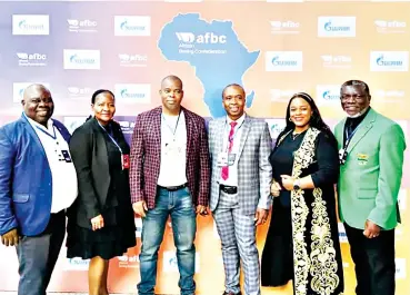  ?? ?? 3 EBA President Webster Lukhele and IBA board member Pearl Dlamini with other African delegates