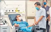  ?? HT ?? CM Arvind Kejriwal interacts with a plasma donor at the Institute of Liver and Biliary Sciences in New Delhi on Thursday.