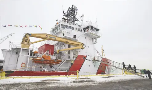  ?? JACQUES BOISINOT / THE CANADIAN PRESS ?? CCGS Captain Molly Kool is unveiled after undergoing a refit and conversion at the Davie shipyard in Lévis, Que. The Canadian Coast Guard’s next heavy icebreaker project has been sent back to the design stage.