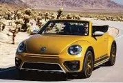  ??  ?? Distinctiv­e exterior elements include a slightly elevated (0.4-inch) ride height, a 0.6-inch-wider track, 18-inch wheels (offered in gold as an option) and a honeycomb patterned front grille punctuated by a silver skid plate