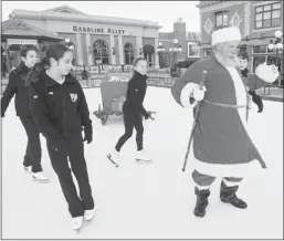  ?? Calgary Herald/files ?? Santa Claus walks across the skating rink at Heritage Park during Once Upon a Christmas celebratio­ns. A reader says Calgarians should enjoy what the city has to offer at this time of year.