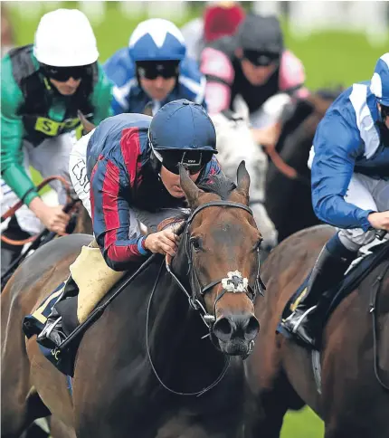  ?? Picture: Getty Images. ?? The Tin Man, front left, battles it out at the front with Tasleet before going on to win the Diamond Jubilee Stakes on Saturday.