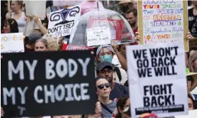  ?? Photograph: Ben Gray/AP ?? People gather in front of the Georgia state capitol in Atlanta on 24 June to protest against the supreme court's decision to overturn Roe v Wade.