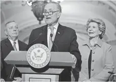  ?? ALEX WONG, GETTY IMAGES ?? Senate Democratic leader Charles Schumer, front, Senate Minority Whip Richard Durbin and Sen. Debbie Stabenow.