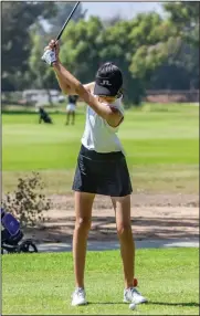  ?? File photo ?? Ashley Song tees off at El Cariso Golf Course earlier this season. Song was named medalist at Foothill League girls golf meet No. 5 on Tuesday at Elkins Ranch.