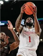  ?? Kevin M. Cox/Associated Press ?? UH guard Jamal Shead had 11 points, four rebounds, two assists and two steals in the win over Texas State.