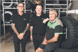  ?? ?? Tyreplus Townsville John Muller (right) is retiring after 30 years and is handing over the keys to new owners Gordan Mccormack and Shaun Mccormack.