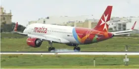  ?? ?? Air Malta will be replaced by KM Malta Airlines today. FILE PHOTO: CHRIS SANT FOURNIER