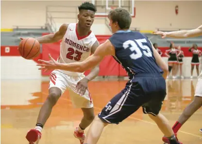  ?? | ALLEN CUNNINGHAM/ FOR THE SUN- TIMES ?? Momence senior Lamar Lillard had 25 points, eight rebounds and six steals against Cissna Park.