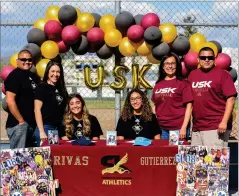  ?? RECORDER PHOTO BY NAYIRAH DOSU ?? Monache High School’s Mia Rivas, center left, and Oriana Gutierrez, center right, signed with the University of Saint Katherine’s women’s softball program, Friday, March 26, 2021, at Monache.