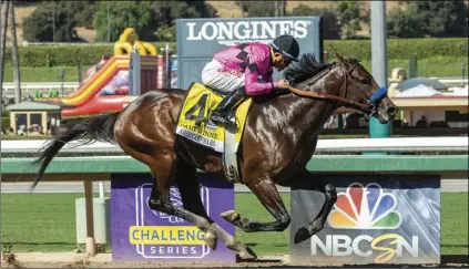  ??  ?? In a photo provided by Benoit Photo, Game Winner and jockey Joel Rosario win the Grade I, $300,000 American Pharoah Stakes horse race on Saturday, at Santa Anita in Arcadia, Calif. BENOIT PHOTO VIA AP