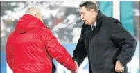  ?? Picture: AFP ?? CALM BEFORE THE STORM: Lions coach Warren Gatland, left, and All Blacks coach Steve Hansen shake on it before the start of their Test