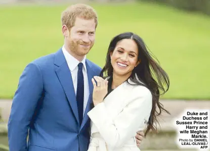  ?? Photo by DANIEL LEAL-OLIVAS / AFP ?? Duke and Duchess of Sussex Prince Harry and wife Meghan Markle.