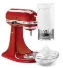  ?? KITCHENAID VIA THE NEW YORK TIMES ?? KitchenAid has added an ice shaver to its roster of attachment­s. There are two blades, fine and coarse. It fits all models of the company’s standing mixers.