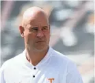  ??  ?? University of Tennessee head coach Jeremy Pruitt walks on the field during media day in Neyland Stadium at University of Tennessee, Sun. Aug. 5, 2018. CAITIE MCMEKIN/NEWS SENTINEL