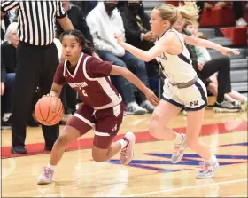  ?? MIKE CABREY — MEDIANEWS GROUP ?? Abington’s Maya Johnson looks to drive past Plymouth Whitemarsh’s Angelina Balcer during their District 1-6A playback on Saturday,