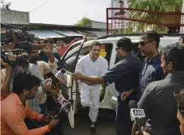  ?? — PTI ?? Congress president Rahul Gandhi arrives to address the media during a visit to his parliament­ary constituen­cy Amethi on Tuesday.