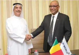  ?? — Supplied photo ?? Suhail Al Banna and Moulaye Ahmed Boubacar sign the concession agreement for DP World to build and operate a Mali logistics hub on Wednesday in Dubai.