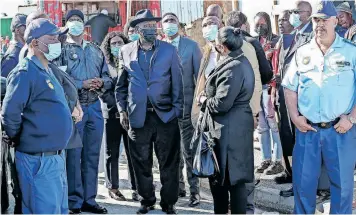  ?? | LEON LESTRADE African News Agency (ANA) ?? POLICE Minister Bheki Cele visited Site C in Khayelitsh­a yesterday where six people were shot dead at the weekend. A woman was stabbed to death not far from the shooting in an alleged domestic dispute.