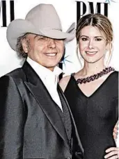  ?? AL WAGNER/INVISION 2019 ?? Dwight Yoakam and Emily Joyce were married in a private California ceremony in March just prior to the quarantine.