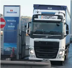  ??  ?? Lorries leaving the Stena Line terminal in Belfast yesterday