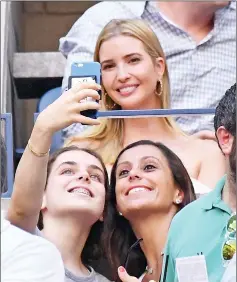  ?? — Photo by Robert Deutsch-USA TODAY Sports ?? Tennis fans take a selfie in front of Ivanka Trump in the men’s singles final during the US Open.