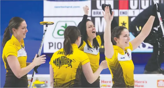  ?? CANADIAN PRESS ?? Team Manitoba lead Briane Meilleur, from left, third Val Sweeting, skip Kerri Einarson and second Shannon Birchard celebrate after winning the Scotties in Moose Jaw, Sask.