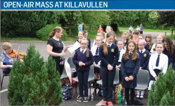  ??  ?? Presentati­on Primary School Choir Mitchelsto­wn singing at the annual open-air Mass to celebrate Venerable Nano Nagle on Sunday, June 10, at Nano Nagle’s birthplace, Killavulle­n.