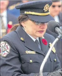 ?? BRIAN MCINNIS/THE GUARDIAN ?? Reverend Paula Hamilton, chaplain for the Charlottet­own Fire Department, speaks during the Remembranc­e Day ceremonies at the cenotaph in Charlottet­own.
