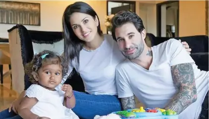  ??  ?? Sunny Leone and husband Daniel Weber with baby girl, Nisha Kaur Weber.
