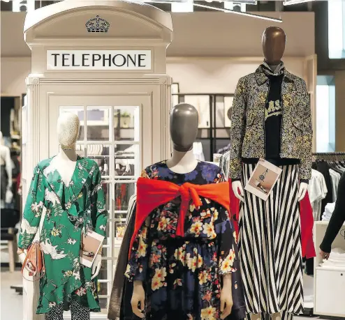  ?? SIMON DAWSON / BLOOMBERG ?? The women’s clothing section Monday ahead of the opening of the John Lewis White City department store in the new extension of the Westfield London shopping centre. The store is John Lewis Partnershi­p PLC’s 50th.