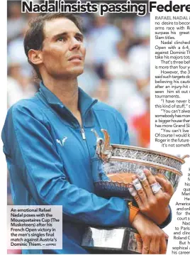  ?? AFPPIX ?? An emotional Rafael Nadal poses with the Mousquetai­res Cup (The Musketeers) after his French Open victory in the men’s singles final match against Austria’s Dominic Thiem. –