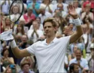  ?? KIRSTY WIGGLESWOR­TH — THE ASSOCIATED PRESS ?? Kevin Anderson celebrates after defeating John Isner, 2624, in the fifth set on Friday.