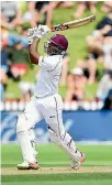  ?? ANDREW CORNAGA/ PHOTOSPORT.NZ ?? Shimron Hetmyer dispatches Mitchell Santner during his entertaini­ng innings of 66 at the Basin Reserve.