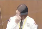  ?? COURT TV ?? In this image from video, Minneapoli­s Firefighte­r Genevieve Hansen wipes her eyes as she testifies Tuesday during the trial of former police Officer Derek Chauvin. Hansen said she wasn’t allowed to provide medical assistance to George Floyd.