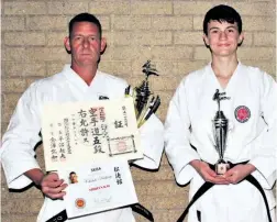  ?? ?? Shihan Christo Riekert and Sempai John Best with the awards they received at the SKISA function on Saturday