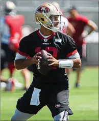  ?? DAI SUGANO – STAFF PHOTOGRAPH­ER ?? Quarterbac­k Jimmy Garoppolo played just three games for the 49ers last season, passing for 718 yards and five touchdowns..