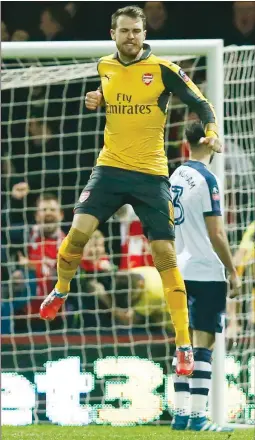  ??  ?? RAM RAID: Aaron Ramsey celebrates scoring Arsenal’s equaliser