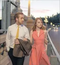  ?? Dale Robinette Lionsgate / Summit ?? THE MUSICAL “La La Land,” starring Ryan Gosling and Emma Stone, is a genuine cheer-bomb, says Justin Chang.