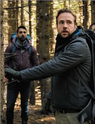  ??  ?? Arsher Ali as Phil and Rafe Spall as Luke in The Ritual.