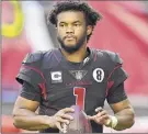  ?? Norm Hall / Getty Images ?? Arizona Cardinals quarterbac­k Kyler Murray says that “to be in the thick of things is all you can ask for at this point in the season.”