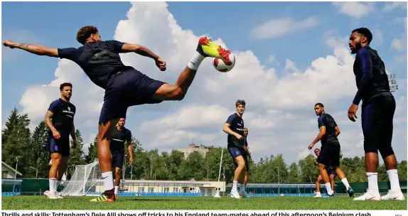  ?? REX ?? Thrills and skills: Tottenham’s Dele Alli shows off tricks to his England team-mates ahead of this afternoon’s Belgium clash