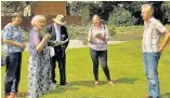  ??  ?? Quorn in Bloom volunteers showing the judges Church View Garden.