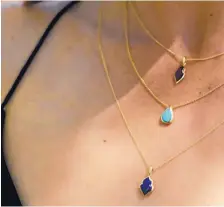  ?? COURTESY OF MATI JEWELERS ?? Layering necklaces and bracelets is a popular trend. These necklaces start at $679 at Màti Jewelers.