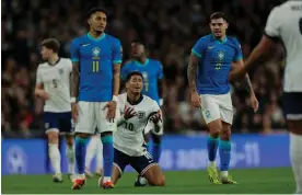  ?? Photograph: Tom Jenkins/ The Observer ?? A frustrated Jude Bellingham after being fouled against Brazil.