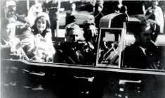  ?? AP file ?? President John F. Kennedy sitting in the rear seat of his limousine while his wife Jacqueline is beside him as their motorcade is passing through a street in Dallas on November 22, 1963. —